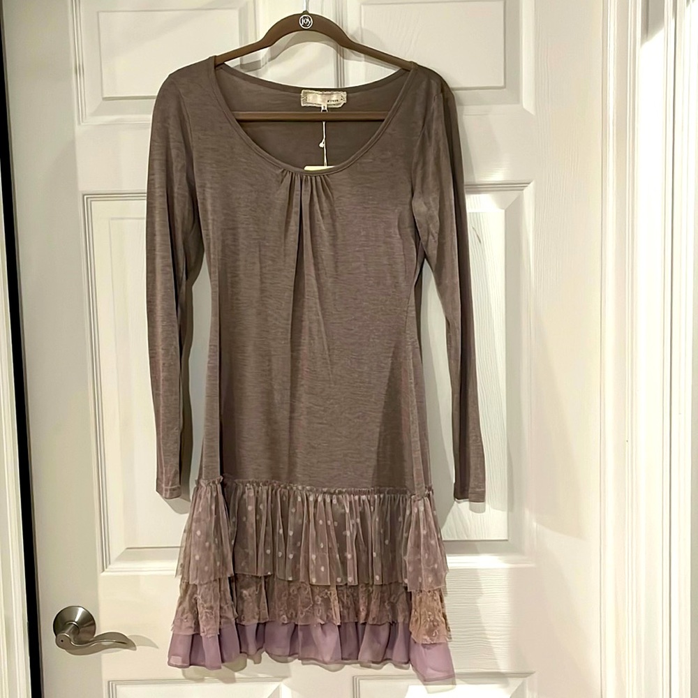 Women’s dress with flutter layers at bottom.